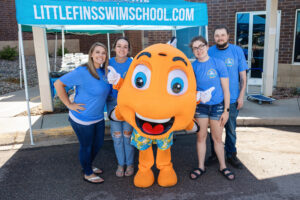 Little Fins team with mascot, Finn the Fish