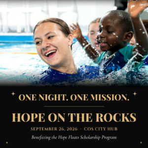 Hope on the Rocks boy and instructor swimming Hope Floats Scholarship event