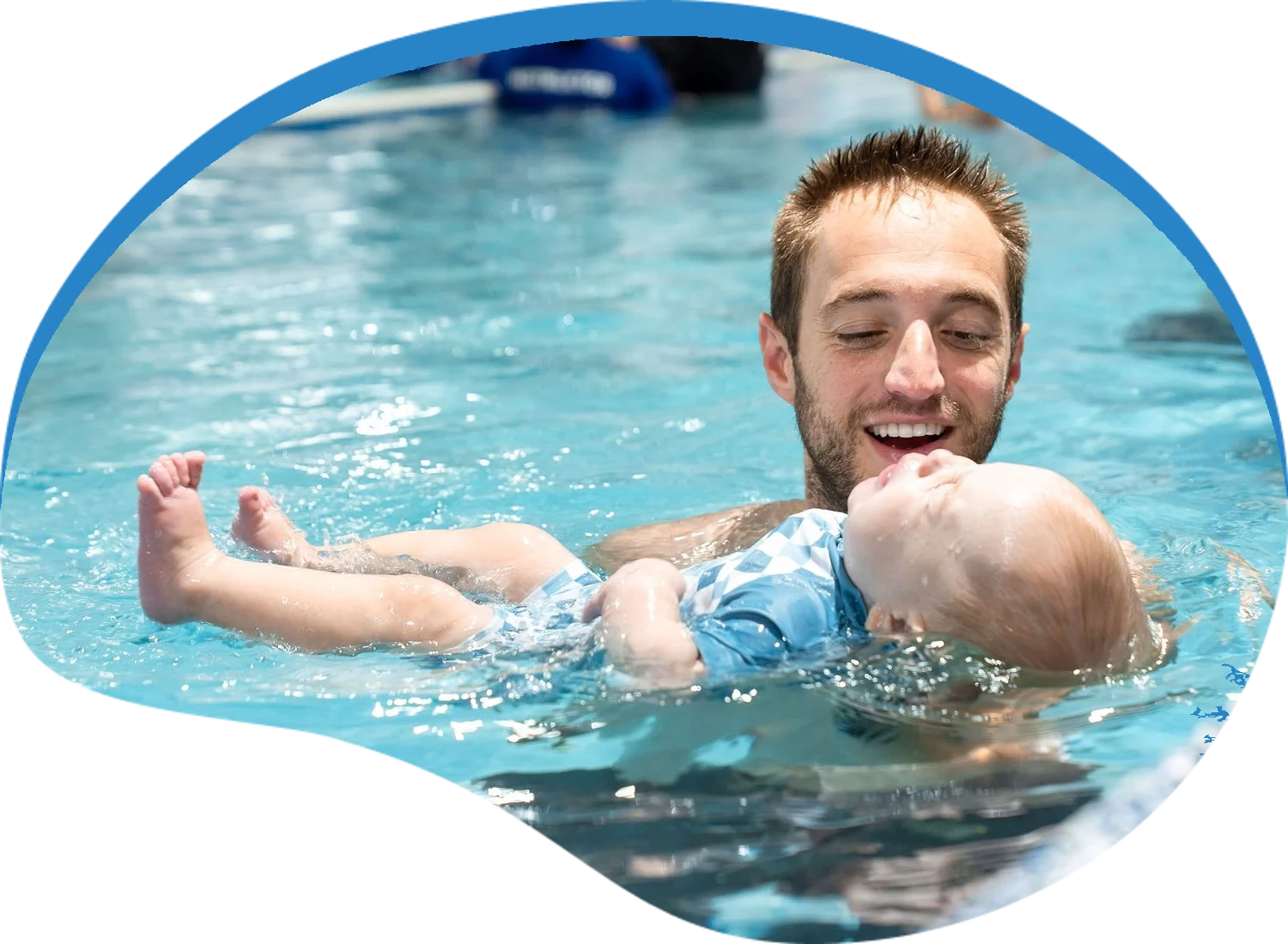 Baby practicing a back float in the pool at Little Fins Swim School