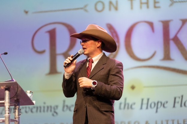 Auctioneer calling bids at Hope on the Rocks