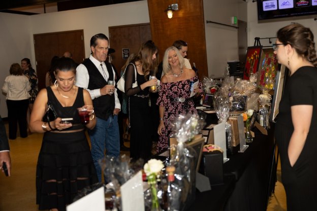 Guests browsing the Hope on the Rocks silent auction