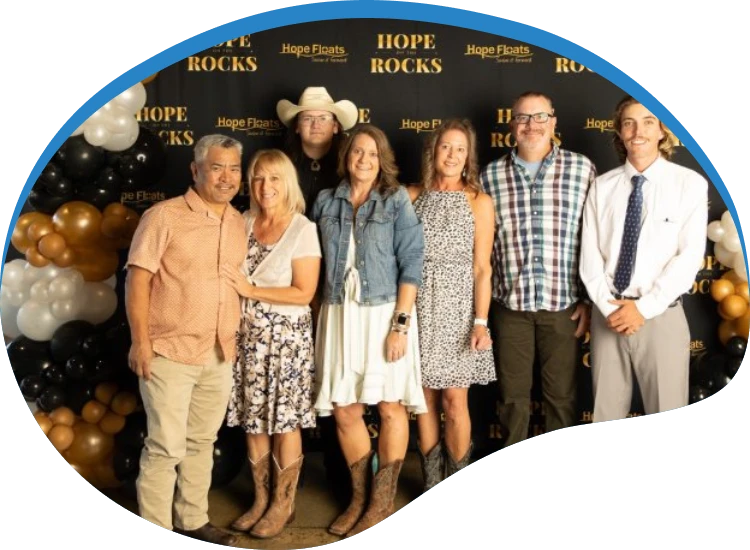 Guests at the Hope on the Rocks step-and-repeat